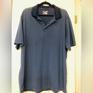 Under Armour golf polo size XL blue/ grey striped. Loose fit shirt